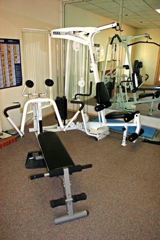 Keep in shape with the universal weight machine in our well-equipped fitness room.
